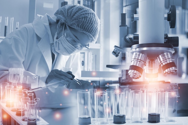 Double exposure microscope Young woman scientific using equipment in the laboratory for research