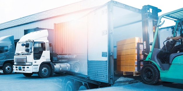 Double Exposure Photos of Forklift Tractor Loading Package Boxes Trucks Loading at Dock Warehouse