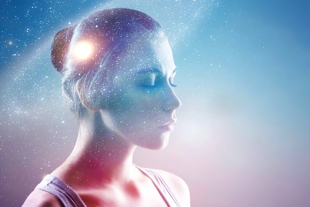 Double exposure portrait of a dreamer young woman face with galaxy universe space