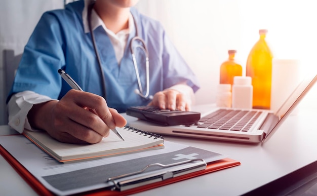 Double exposure of technology healthcare And Medicine concept Doctors using digital tablet and modern virtual screen interface icons panoramic banner blurred background