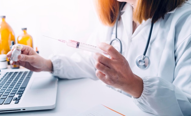 Double exposure of technology healthcare And Medicine concept Doctors using digital tablet and modern virtual screen interface icons panoramic banner blurred background