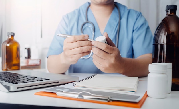 Double exposure of technology healthcare And Medicine concept Two doctors using digital tablet and modern virtual screen interface icons panoramic banner blurred background