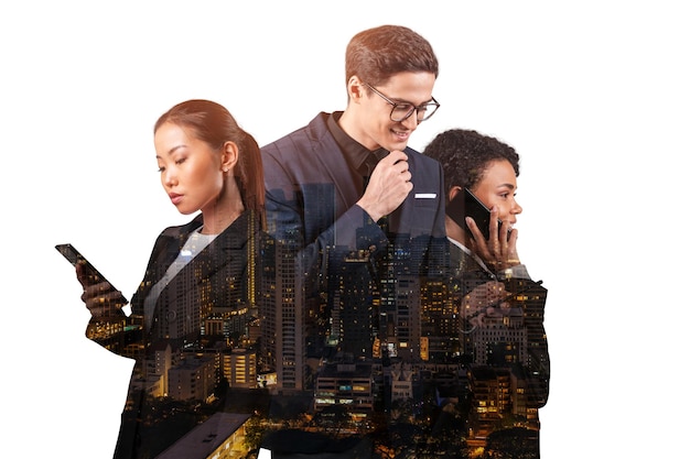 Double exposure of three young successful business people man and woman standing in front of Asian city Bangkok background Concept of hard work and study Modern life way Night time