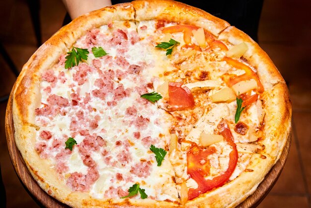 Double pizza on a table in a cafe