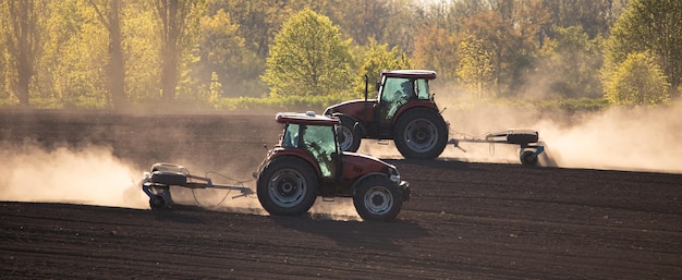 Double Trouble Two Tractors Cultivating the Fields