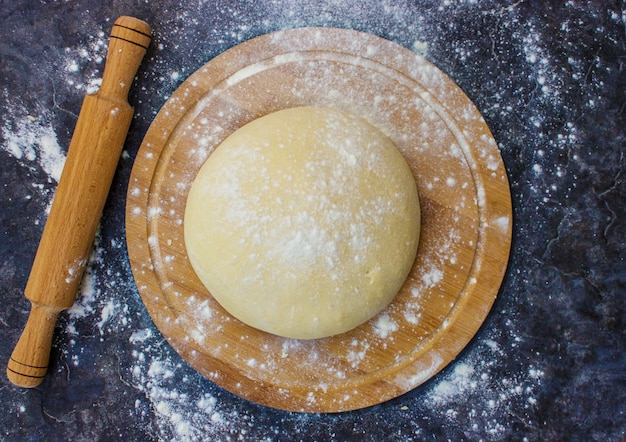 Dough on a dark background. Selective focus.