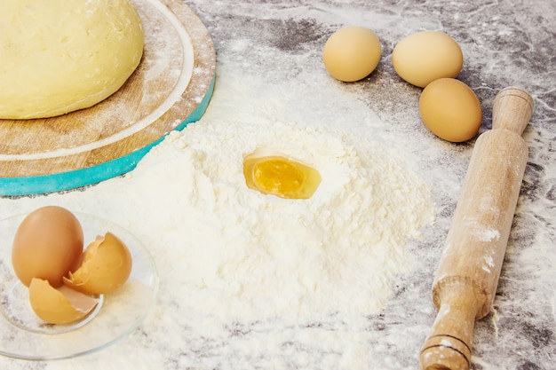 Dough on a dark background. Selective focus.