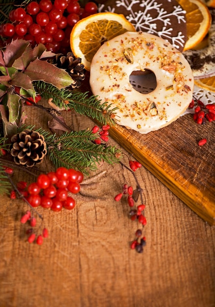 Dough ingredients and decorations on vintage planked wood table from above Rural kitchen layout with free text space