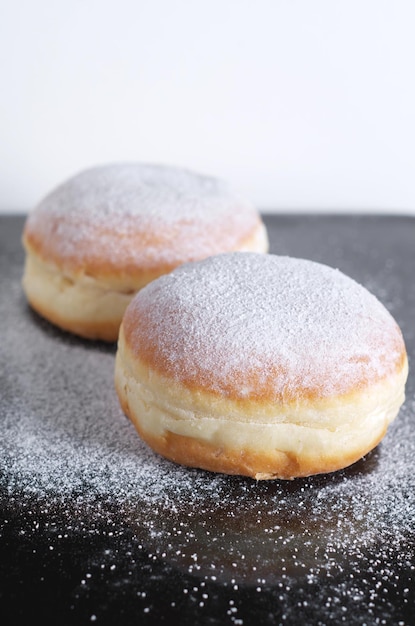 Doughnuts with icing sugar