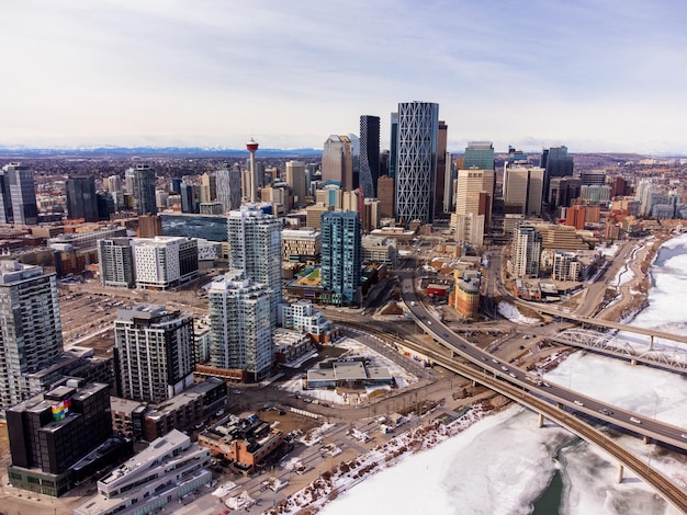 Downtown Calgary and frozen Bow River during winter City of Calgary aerial view Alberta Canada