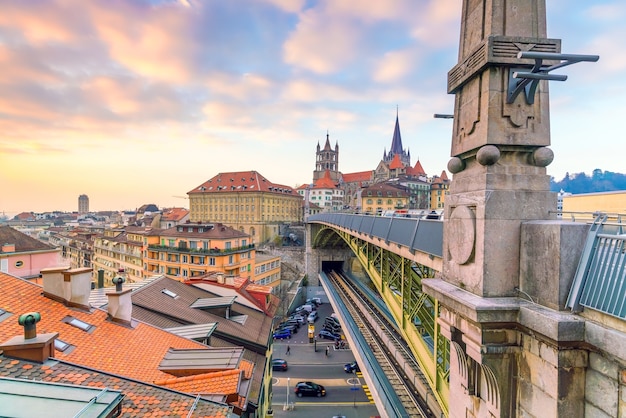 Downtown Lausanne city skyline in Switzerland at sunset