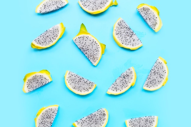 Dragon fruit or pitaya on blue background Delicious tropical exotic fruit Top view