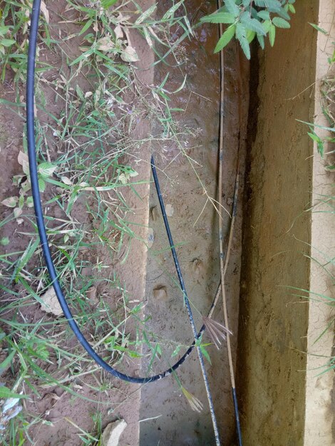 drainage that no longer drains water due to drought. cables left in drains