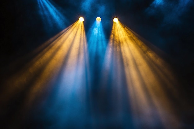 Photo dramatic blue and orange stage lights beaming across a theater stage for a live concert performance