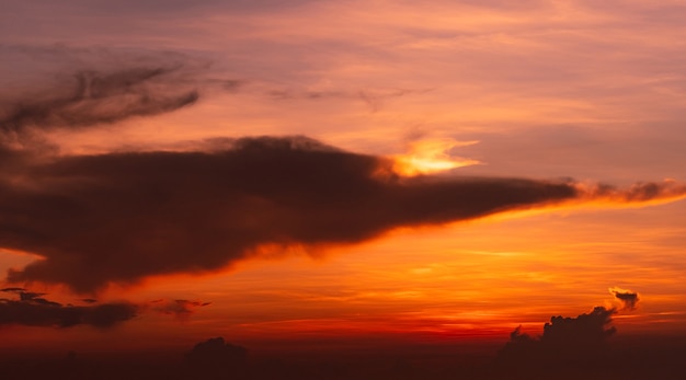 Dramatic red and orange sunset sky and clouds abstract background