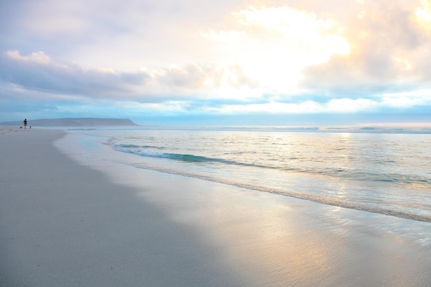 Dramatic sky at sunset on Noordhoek Beach in Cape Town South Africa