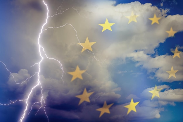 Dramatic stormy clouds with lightning next to EU stars flag symbol Upcoming crisis and economy problems in Europe