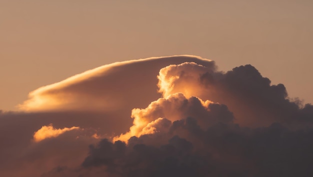 Dramatic sunset clouds with vibrant colors creating a serene atmosphere