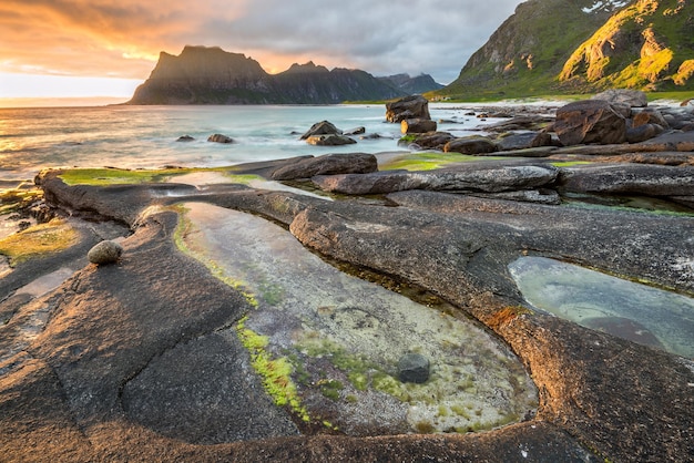 Dramatic sunset over Uttakleiv beach on Lofoten islands Norway