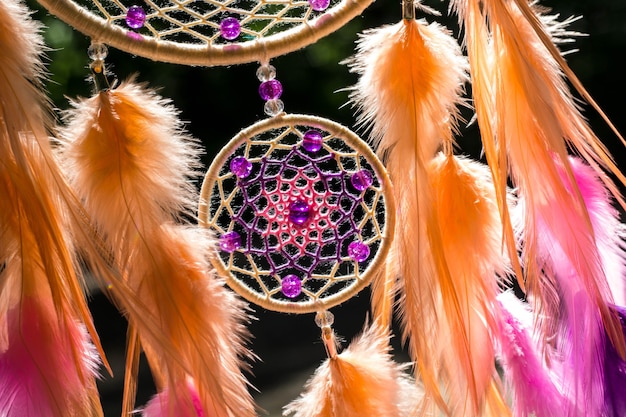 Dream catcher with feathers threads and beads rope hanging. Dreamcatcher handmade