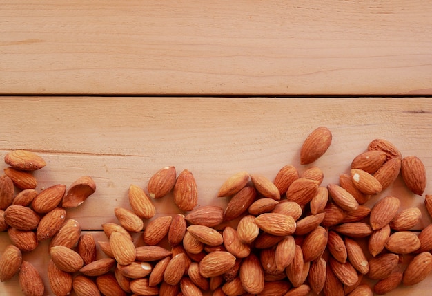 dried almond nut on wood table