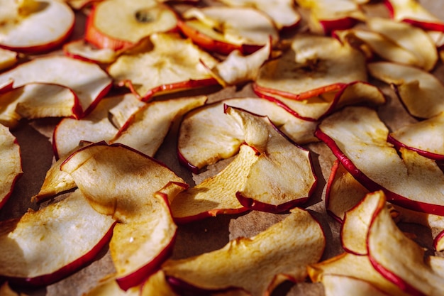 Dried apples cut into slices in sun to dry