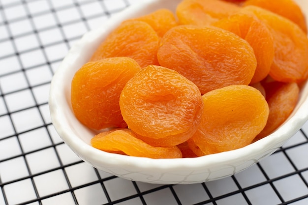 Dried apricots on white background