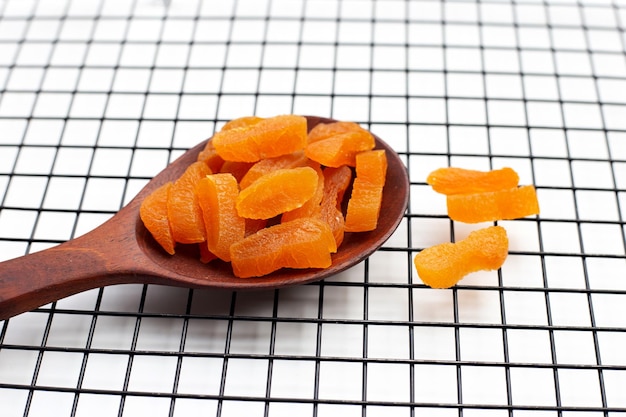 Dried apricots on white background