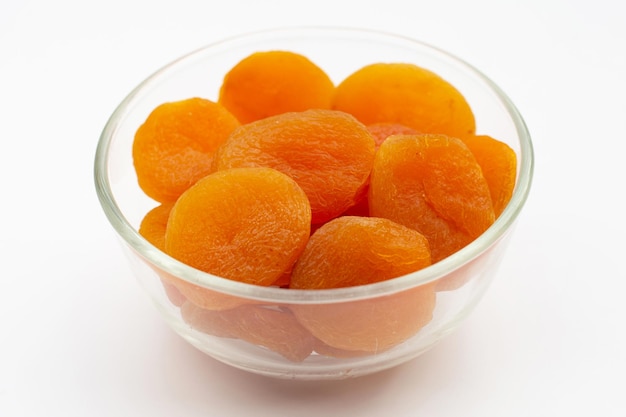 Dried apricots on white background