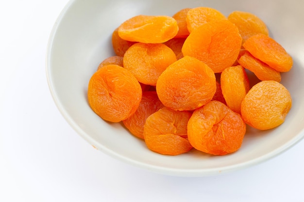 Dried apricots on white background