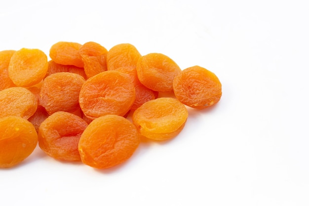 Dried apricots on white background