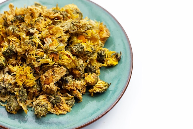 Dried chrysanthemum flower on white background