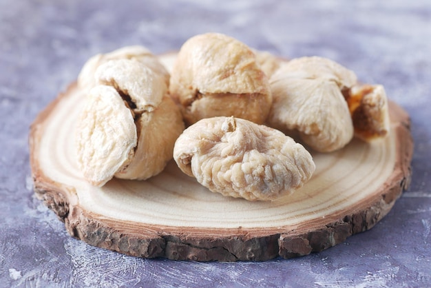 Dried fig fruit on on a plate on table