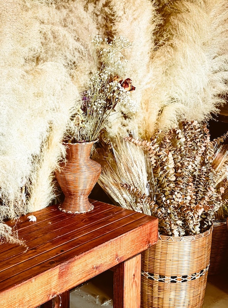 Dried flowers in vintage bamboo vase