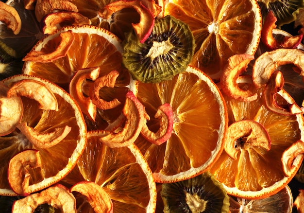 Dried fruit slices orange lemon apple keefy closeup top view