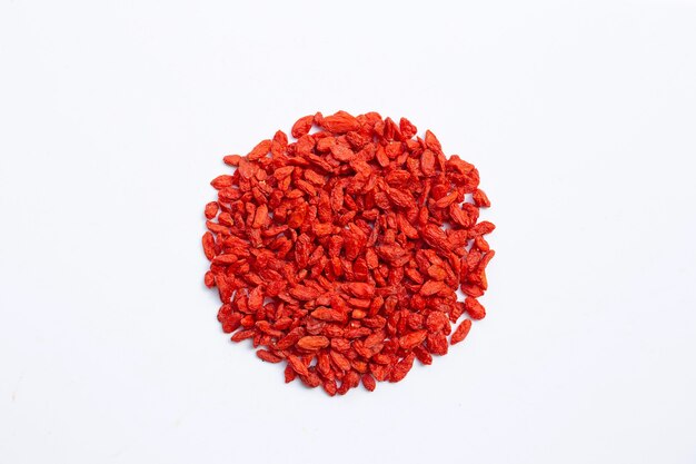 Dried goji berries on white isolated. Top view