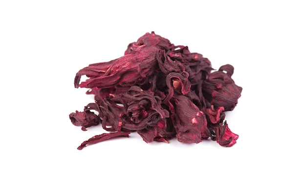 Photo dried hibiscus flowers. hibiscus tea close-up, isolated on white