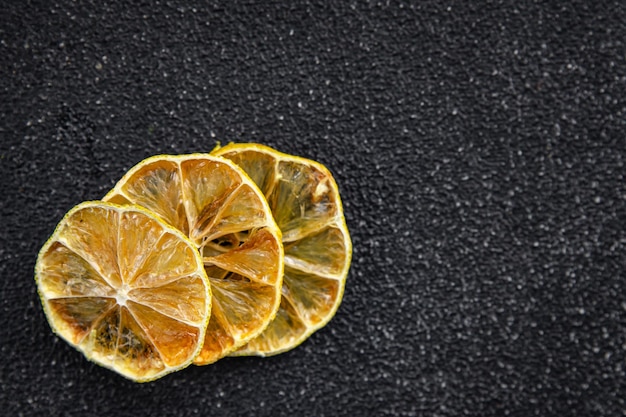 dried lemon slice meal food snack on the table copy space food background rustic top