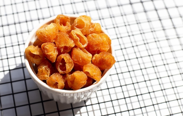 Dried longan on white background