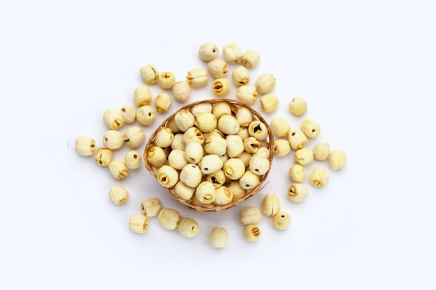 Dried lotus seeds on white background