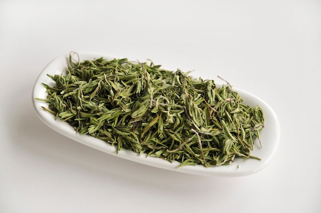 Dried mint herb on a white bowl