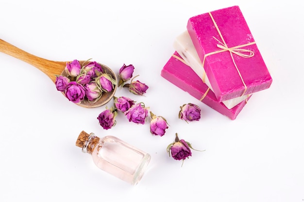 Dried pink rose flowers and rose soap