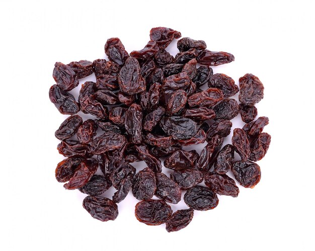 Dried raisins on white ,Top view