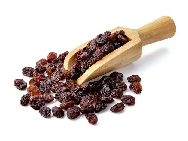 Dried raisins on white.