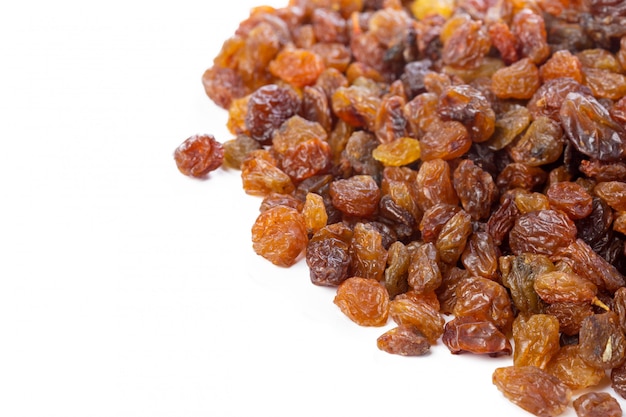 Dried raisins on white 