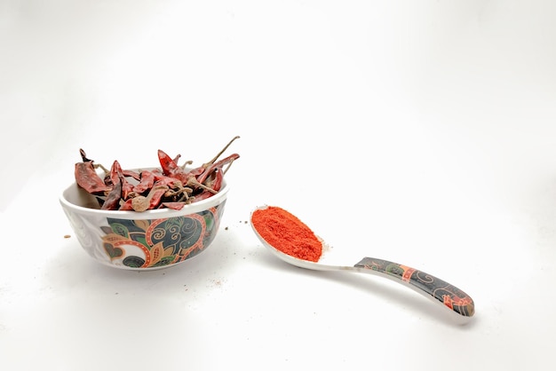 Dried red chili or chilli cayenne pepper isolated on white background.