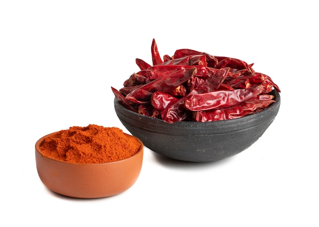 Dried Red Chili Peppers with Chili Powder on White Background