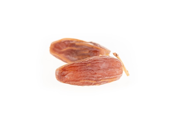 Dried ripe dates fruits isolated on white background. Date palm isolated on a white background