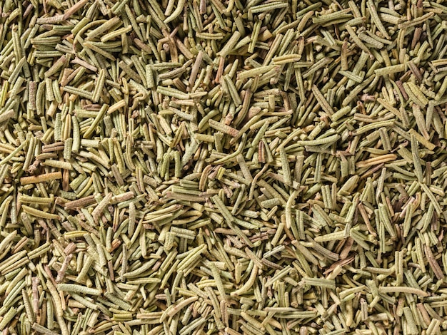 Dried rosemary condiment background used as a spice in cooking Food flavoring