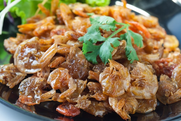 dried shrimp fried on black plate